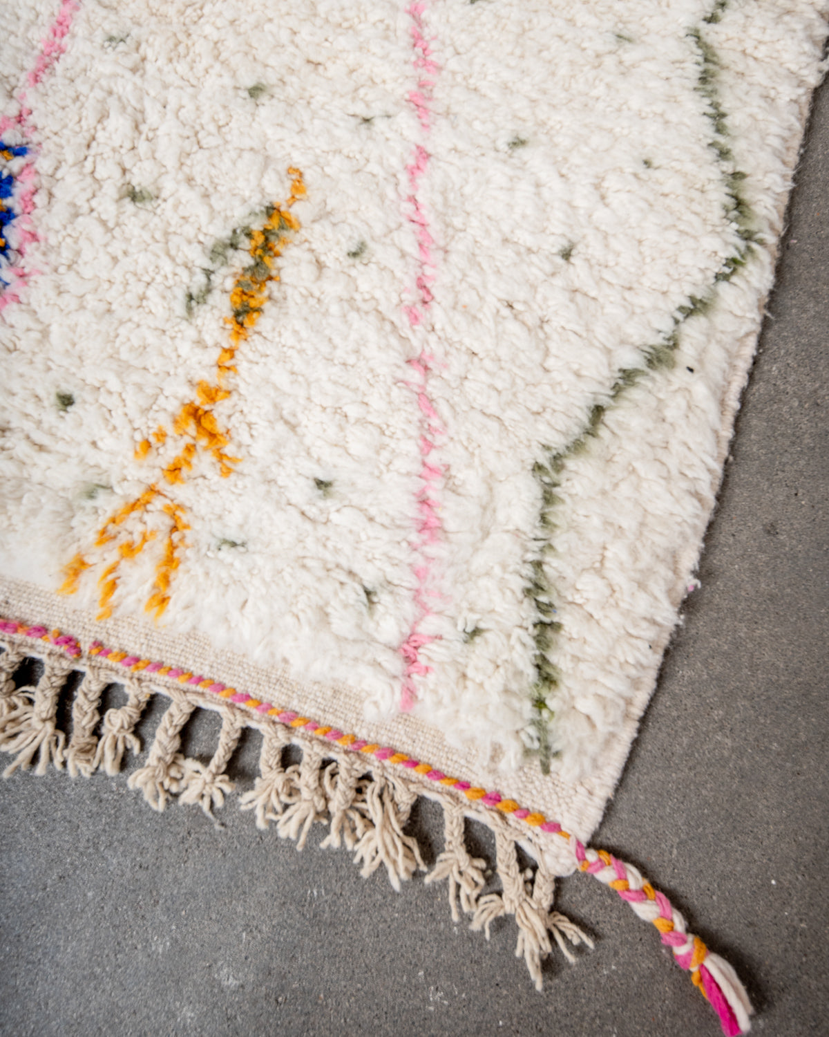Modern, designer, handcrafted Berber rug from Morocco. Beniourain carpet with beautiful colours and patterns and fluffy wool texture.